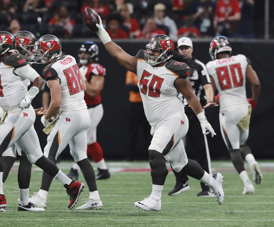 Tampa Bay Buccaneers defensive lineman Vita Vea (50)celebrates his touchdown catch during the second quarter of an NFL football game against the Atlanta Falcons, Sunday, Nov. 24, 2019, in Atlanta. (Curtis Compton/Atlanta Journal-Constitution via AP)