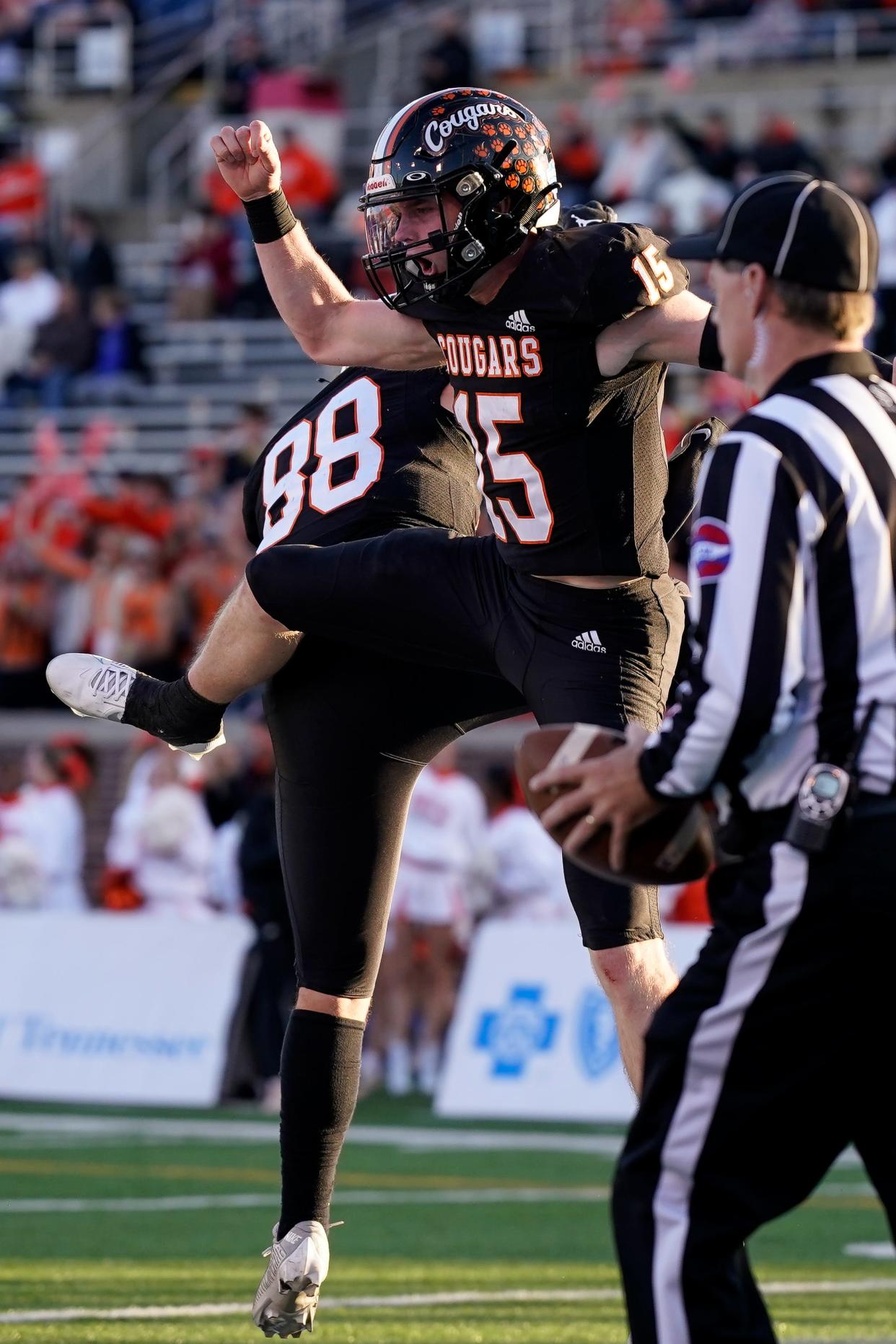 MTCS’s Yates Geren (15) celebrates his touchdown against Friendship Christian with Braden Box (88) during the third quarter of a Division II-A championship game at Finley Stadium in Chattanooga, Tenn., Thursday, Nov. 30, 2023.