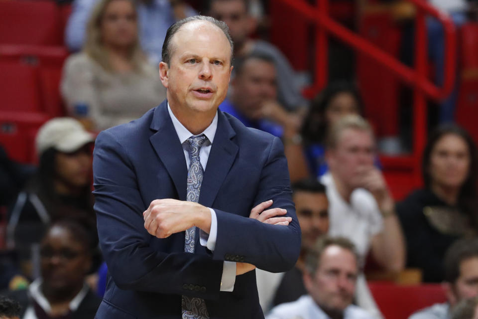 New York Knicks coach Mike Miller calls out during the first half of the team's NBA basketball game against the Miami Heat, Friday, Dec. 20, 2019, in Miami. (AP Photo/Wilfredo Lee)