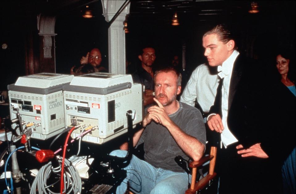 James Cameron and Leonardo DiCaprio on the set of <em>Titanic</em>. (Photo: Mary Evans/Ronald Grant/Everett Collection)