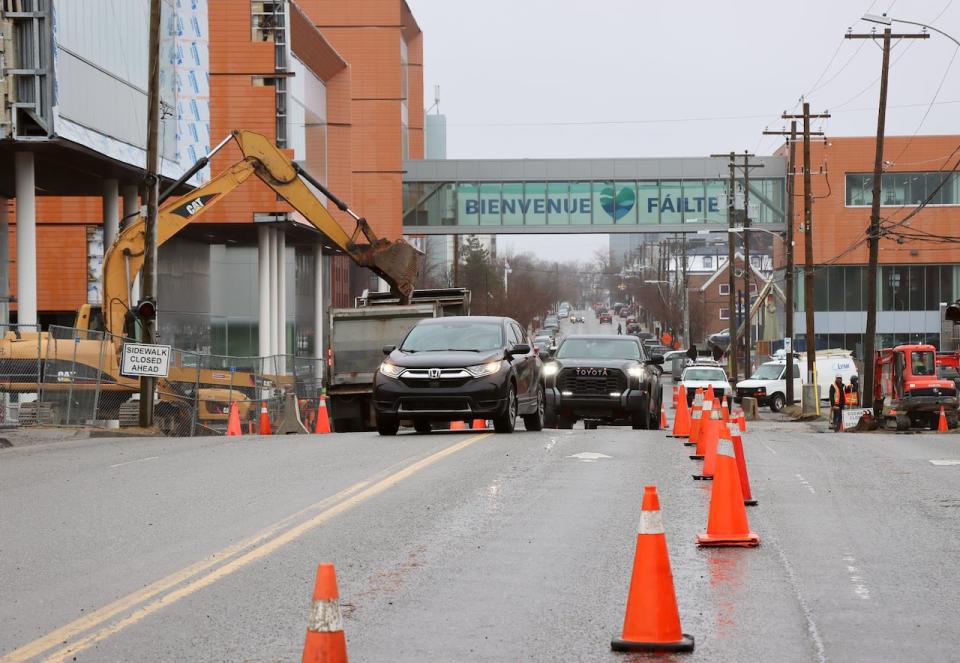 Construction of Nova Scotia Community College's downtown Sydney campus and plans to start work on nearby Charlotte Street have one pub owner considering closing for the summer. (Tom Ayers/CBC - image credit)