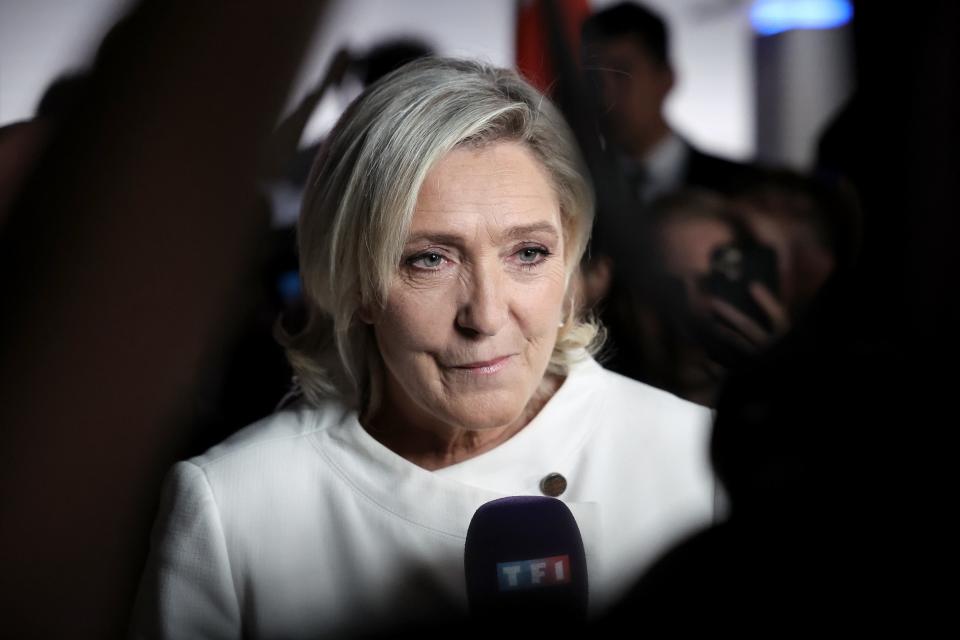 Marine Le Pen addresses journalists at the party’s headquarters after preliminary results of the second round of the French parliamentary elections, in Paris (EPA)