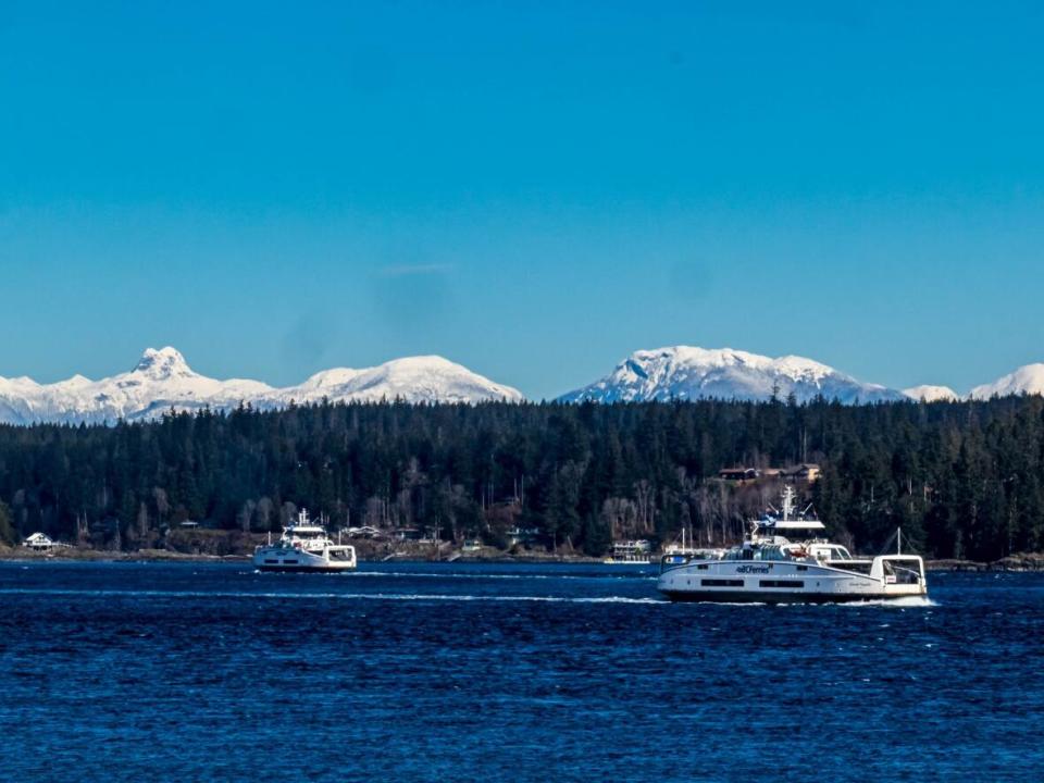 Two of B.C. Ferries new hybrid vessels travel between Campbell River and Quadra Island. (Hazel Trego - image credit)