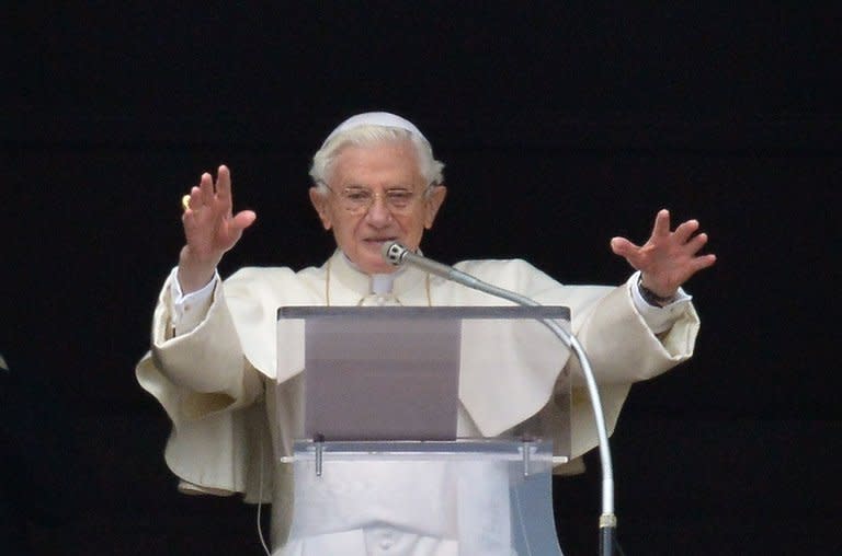 Pope Benedict XVI celebrates his last Sunday prayers before stepping down, on February 24, 2013 at St Peter's Square in Vatican city. Pope Benedict XVI issued a decree on Monday allowing cardinals to bring forward a conclave to elect his successor, as the resignation of a top cardinal and deepening intrigue in the Vatican overshadowed the run-up to the vote