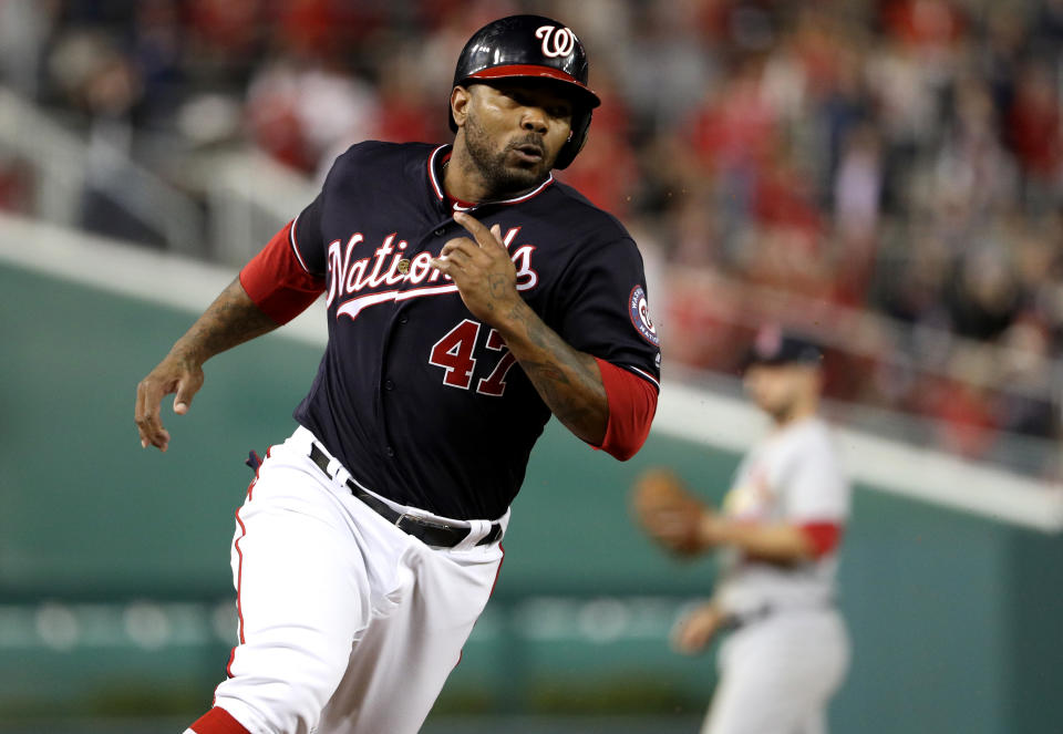 WASHINGTON, DC - OCTOBER 14: Howie Kendrick #47 of the Washington Nationals runs the bases to score after Ryan Zimmerman #11 hit a single in the seventh inning of game three of the National League Championship Series against the St. Louis Cardinals at Nationals Park on October 14, 2019 in Washington, DC. (Photo by Patrick Smith/Getty Images)