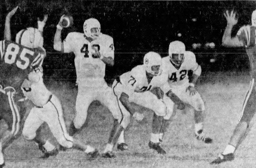 In this Times Record News file photo from Oct. 29, 1965, Rider's Bub Deerinwater (43) passes against Arlington High.
