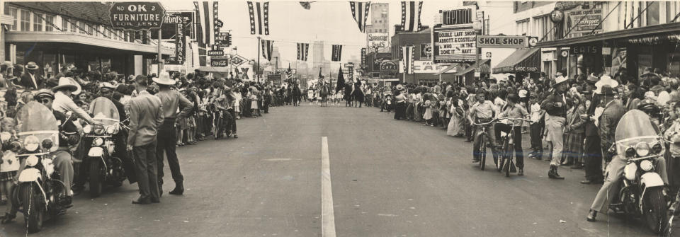 The 89er Parade is showing looking north down Robinson from Commerce in this 1949 photo.