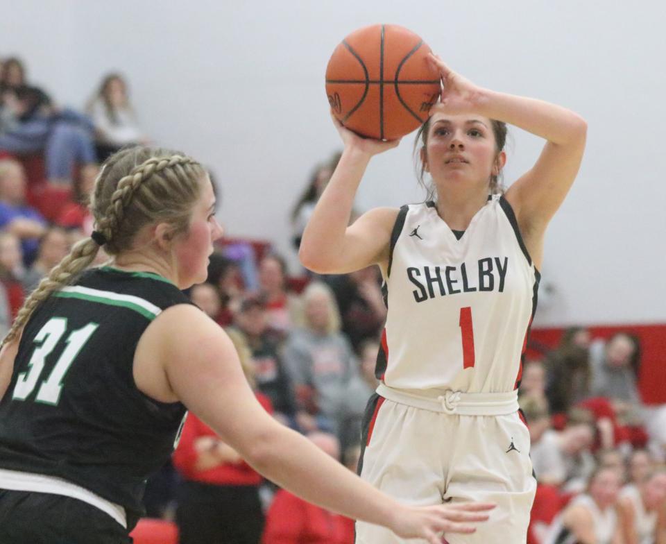 Shelby's Demi Hipp fires a 3-pointer during the Whippets key MOAC win over Clear Fork on Thursday night.