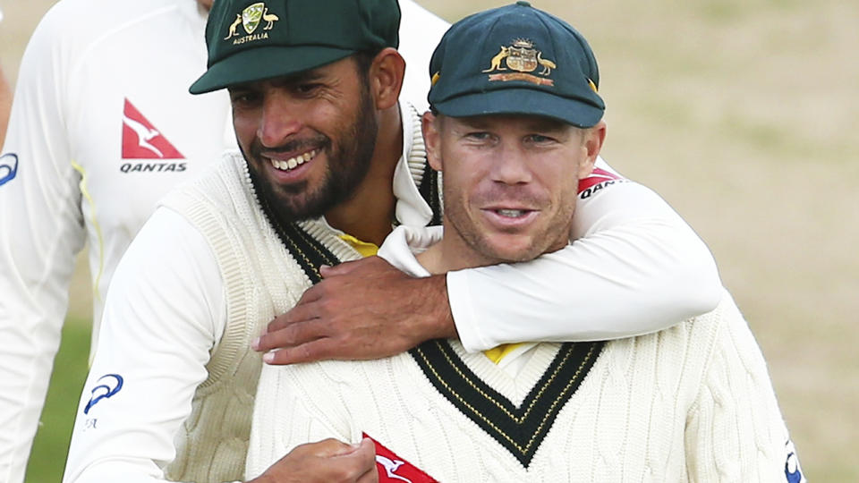 Fawad Ahmed and David Warner, pictured here in action for Australia in a tour match in 2015.