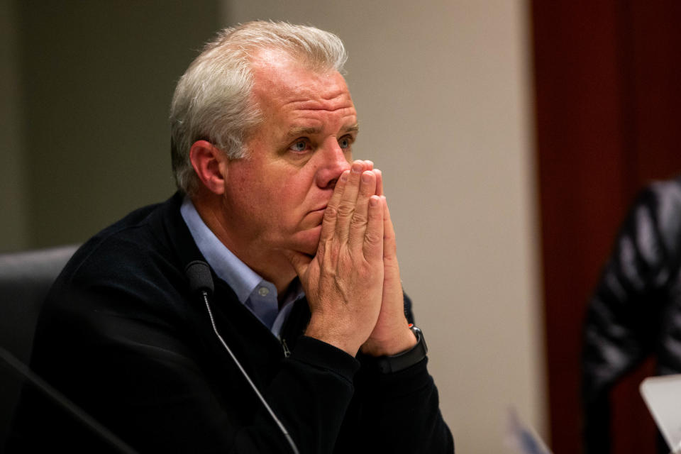 Commissioner Doug Zylstra listens to members of the public on Tuesday, Jan. 24, in West Olive.