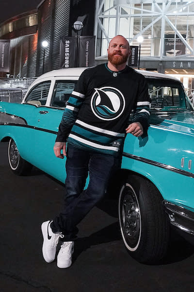 Former Sharks player Raffi Torres dons San Jose's new Cali Fin jerseys. (Photo by Kavin Mistry/San Jose Sharks)