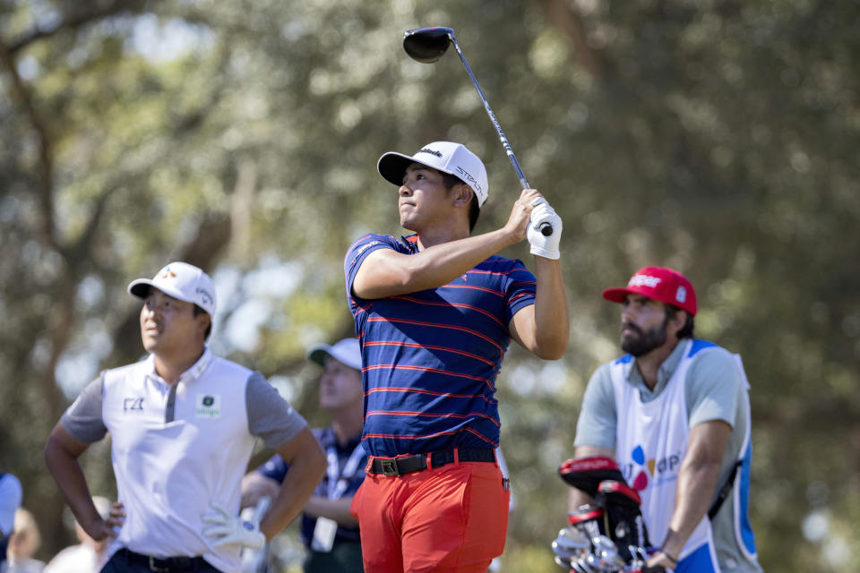 Kurt Kitayama watches his drive down the second fairway during the final round of the CJ Cup golf tournament Sunday, Oct. 23, 2022, in Ridgeland, S.C. (AP Photo/Stephen B. Morton)