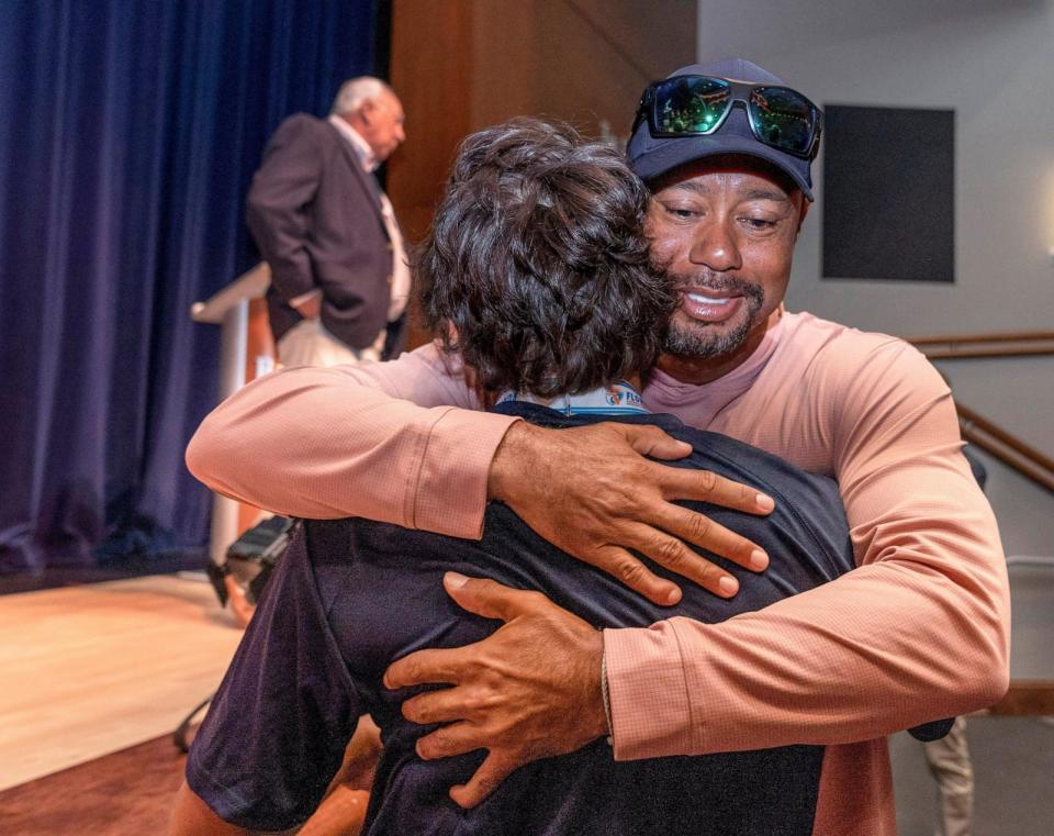 PHOTO: Tiger Woods hugs his son, Charlie Woods during a ring ceremony to celebrate The Benjamin School boys golf team 2023 state championship on March 26, 2024 in Palm Beach Gardens, Fla. (Greg Lovett/The Palm Beach Post/USA Today Network via Imagn)