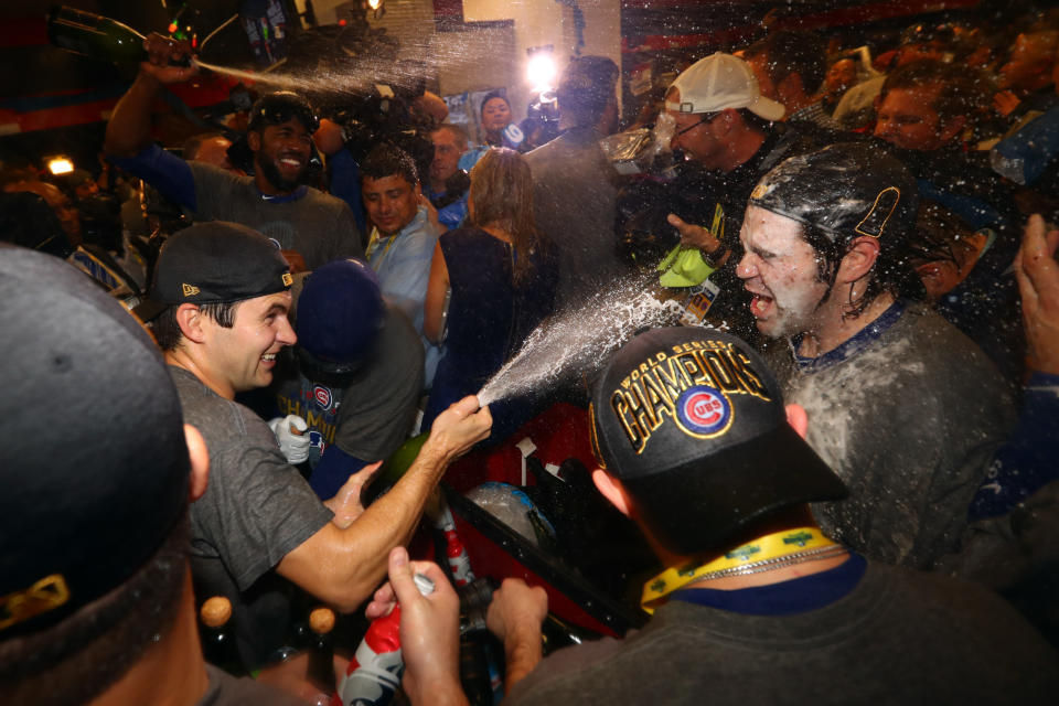 CLEVELAND, OH - NOVEMBER 2:  Members of the Chicago Cubs celebrate in the clubhouse after defeating the Cleveland Indians in Game 7 of the 2016 World Series at Progressive Field on Wednesday, November 2, 2016 in Cleveland, Ohio. (Photo by Alex Trautwig/MLB Photos via Getty Images) 