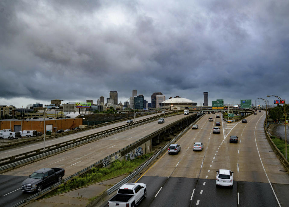 Vehicles make their way on I-10 as bands of rain from Tropical Storm Barry from the Gulf of Mexico move into New Orleans, La., Friday, July 12, 2019. (Photo: Matthew Hinton/AP)