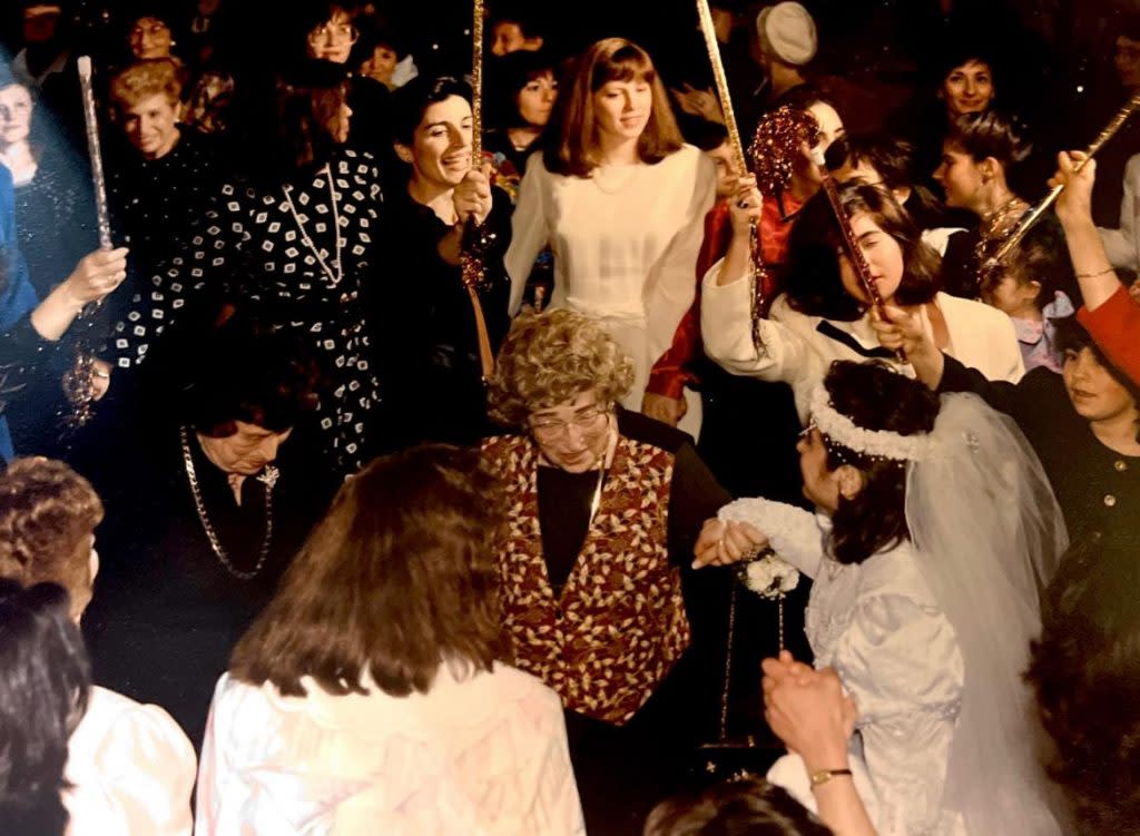 Jill on her wedding day with Ilse (center, brown vest) and Carla (left, in black).