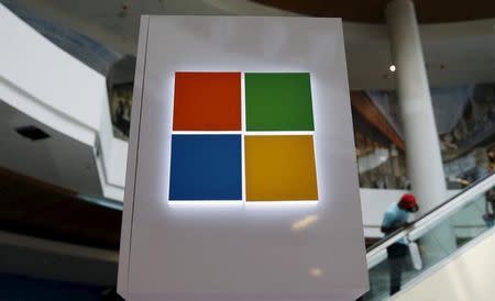 A Microsoft logo is seen at a pop-up site for the new Windows 10 operating system at Roosevelt Field in Garden City, New York July 29, 2015. REUTERS/Shannon Stapleton