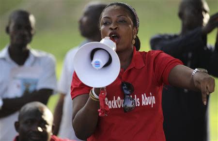A protester addresses a sit-in rally about the abducted schoolgirls, at the Unity Fountain in Abuja May 15, 2014. REUTERS/Afolabi Sotunde