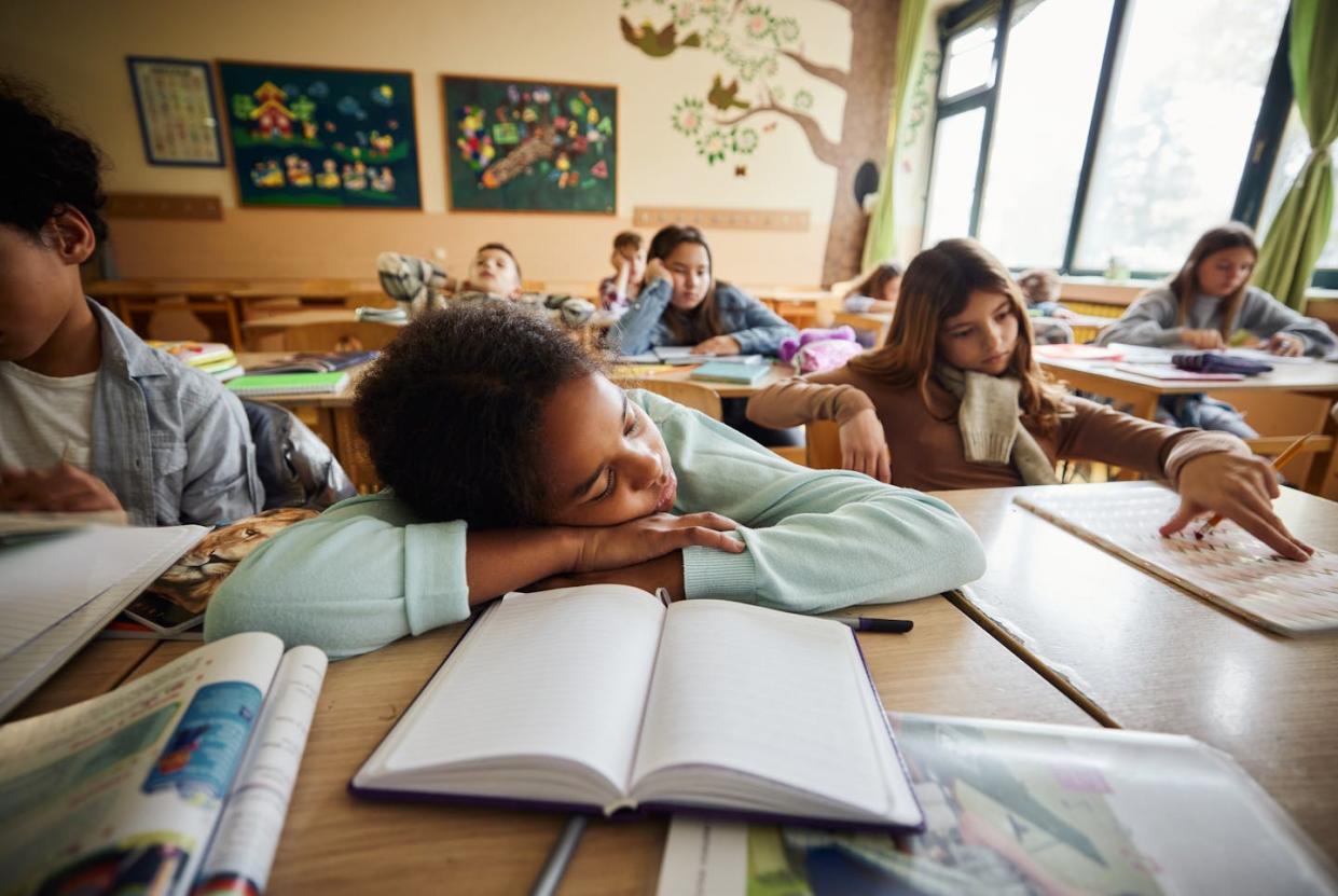 A poor night's sleep has consequences on behavior, academic performance and overall health. <a href="https://www.gettyimages.com/detail/photo/this-class-is-boring-royalty-free-image/1443499738?phrase=sleep+children&adppopup=true" rel="nofollow noopener" target="_blank" data-ylk="slk:skynesher/E+ via Getty Images;elm:context_link;itc:0;sec:content-canvas" class="link ">skynesher/E+ via Getty Images</a>