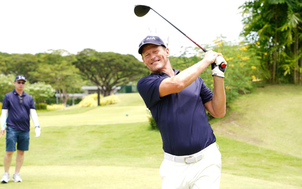 Former Tottenham and Manchester United star Teddy Sheringham joins in the golfing fun at the AlA Charity Golf 2022 event at Tanah Merah Country Club. (PHOTO: AIA)