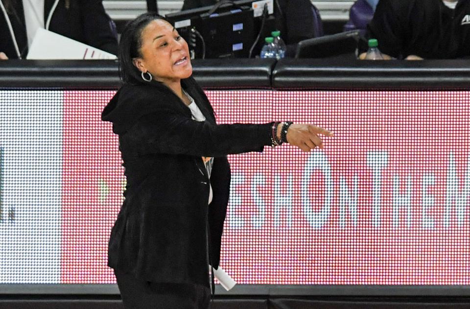South Carolina Coach Dawn Staley communicates with players in the game with Clemson during the second quarter at Littlejohn Coliseum Thursday, November 17, 2022.