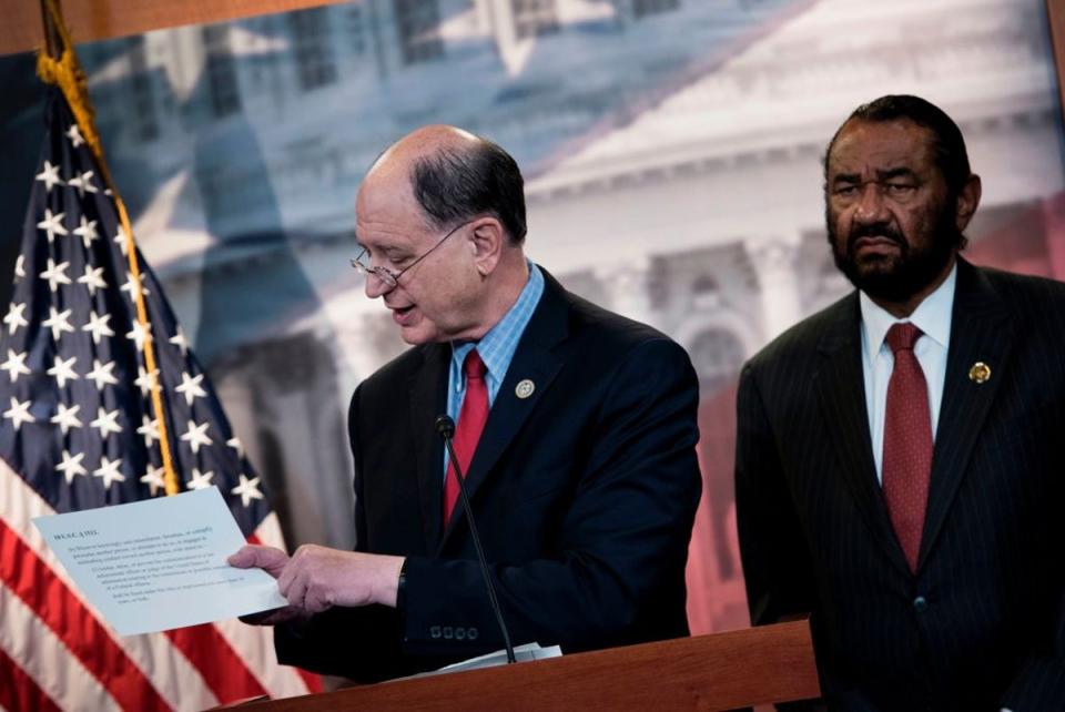 Brad Sherman, left, pictured with fellow Democratic congressman Al Green, said his party could help save the Speaker – as long as Gaza aid was on the table (BRENDAN SMIALOWSKI/AFP/Getty Images)