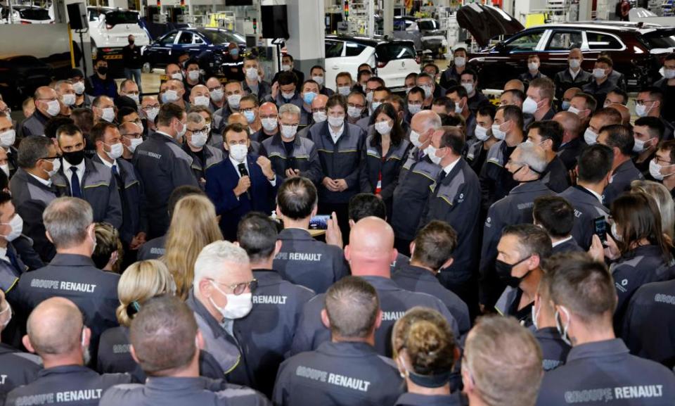 Emmanuel Macron speaks to Renault workers during his visit in 2021 to the future site of an Envision AESC plant in Douai, where Renault is developing an electric vehicle manufacturing hub.