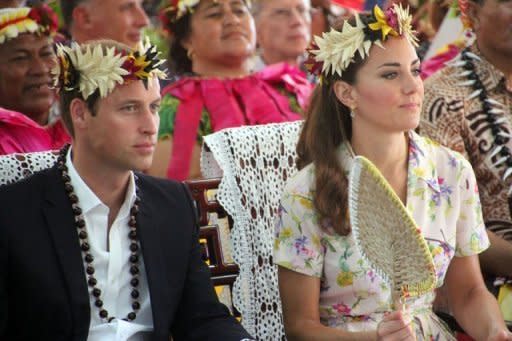 Prince William (L) and his wife Catherine attend a farewell ceremony in Tuvalu on September 19. A Danish magazine on Thursday became the latest to run pictures of Prince William's wife Catherine topless, despite moves by furious British royals to stop the spread of the photos