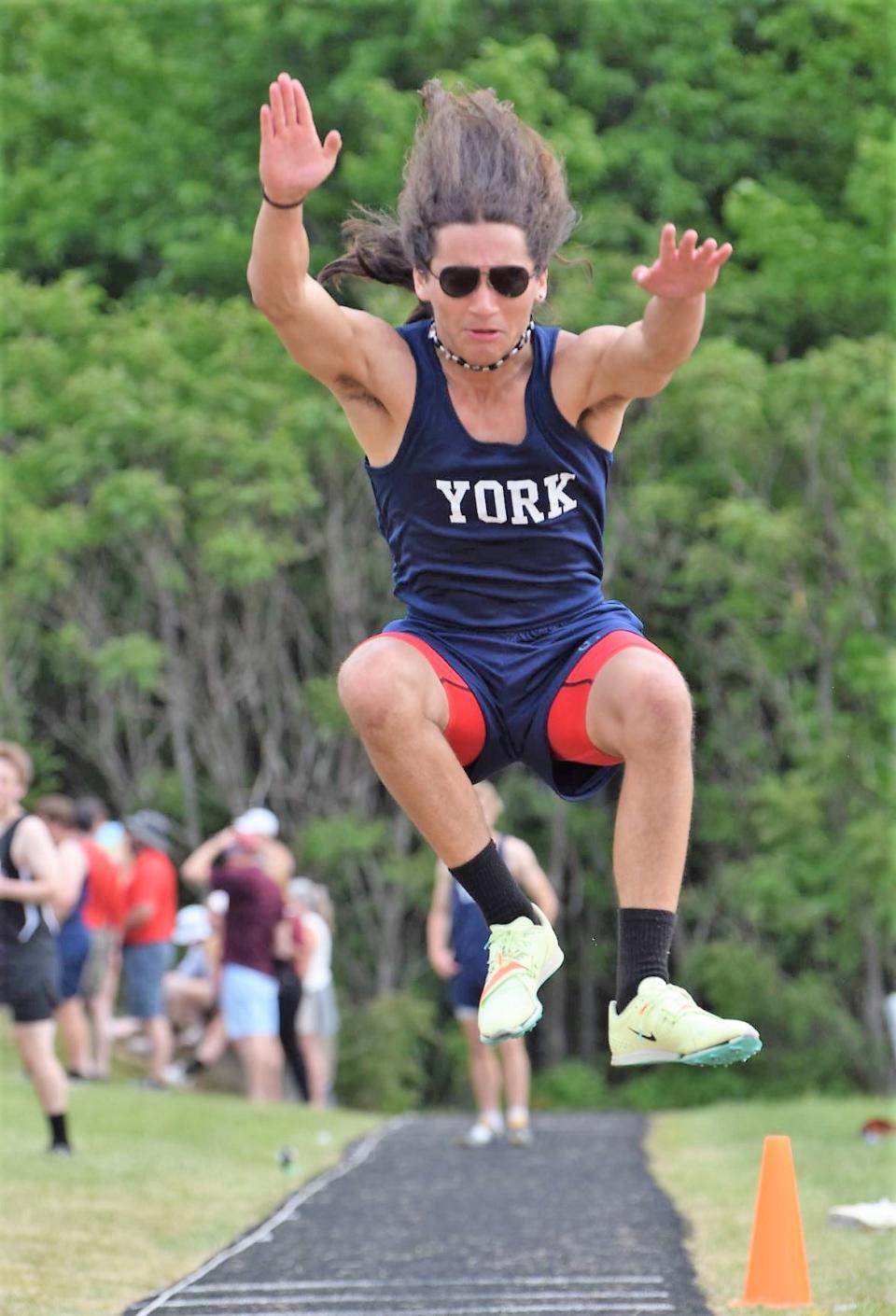 York’s Liam Dunn elevates in the long jump on Saturday.