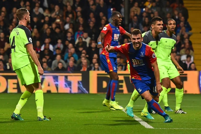 Crystal Palace's Scottish midfielder James McArthur (3rd R) celebrates after scoring his second goal during the English Premier League football match between Crystal Palace and Liverpool at Selhurst Park in south London on October 29, 2016