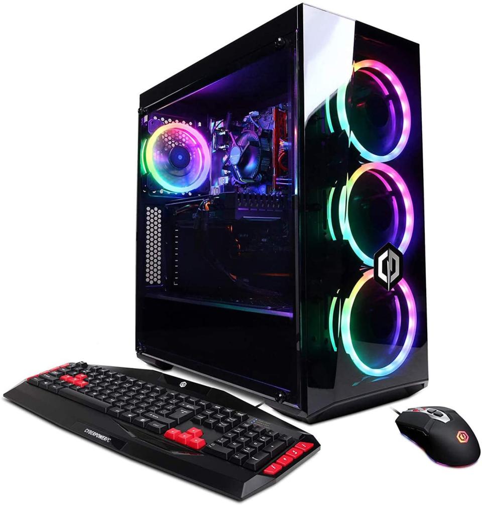 A desktop computer set with RGB fans, keyboard, and mouse