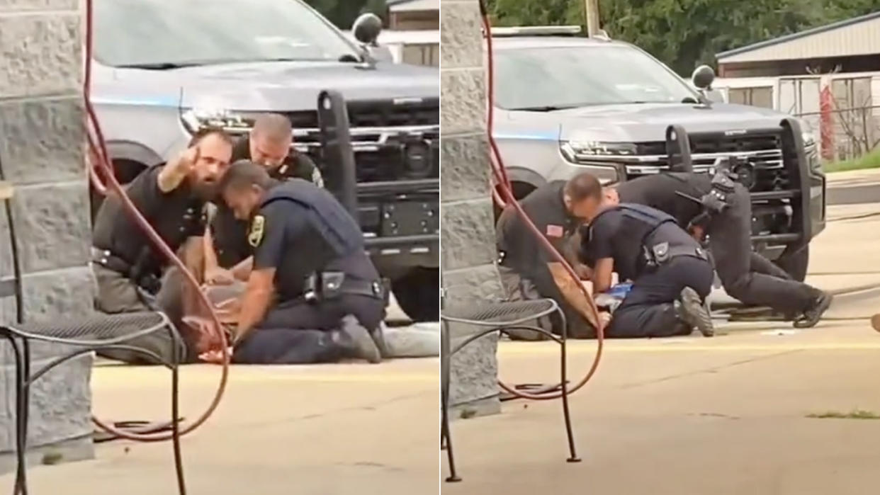 Three Arkansas police officers repeatedly punch 27-year-old Randall Worcester, who is being held supine on the ground.