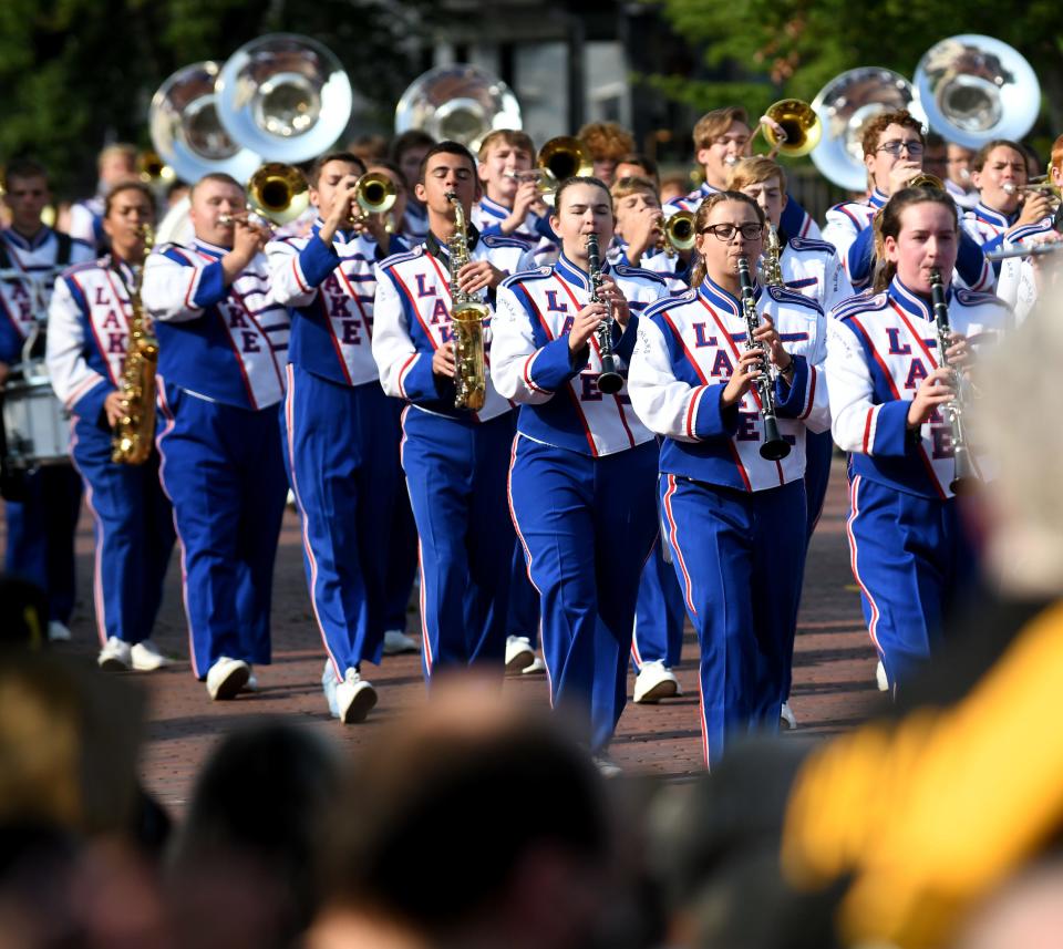 The Lake High School Marching Band performs in the 2021 Pro Football Hall of Fame Canton Repository Grand Parade.