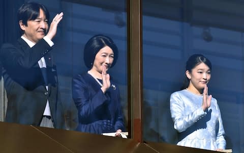 Japan's Princess Mako with her parents, Prince Akishino and Princess Kiko - Credit: KAZUHIRO NOGI/AFP