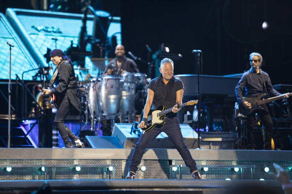 Springsteen performing during the opening night of his North American tour at Wrigley Field