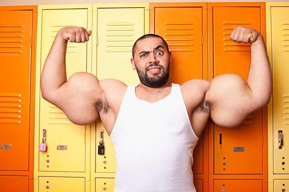 This real life Popeye set the record for the world's biggest arms, measuring 31in each. Moustafa Ismail, from Egypt, denies any use of steroids, shuns spinach and works out everyday in a suburb in Boston, America. He eats a gruelling diet of seven pounds of protein, nine pounds of carbohydrates and three gallons of water each day (Guinness World Records)