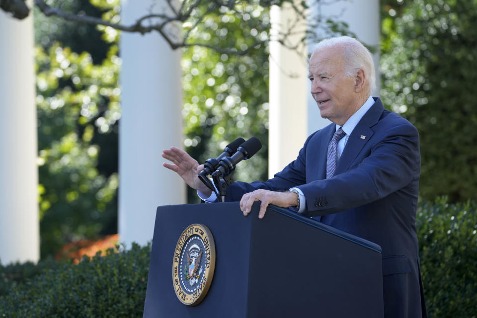 President Joe Biden speaks in the Rose Garden of the White House in Washington, Wednesday, Oct. 11, 2023, about efforts to eliminate hidden junk fees. The Federal Trade Commission on Wednesday proposed a rule to ban any hidden and bogus junk fees, which can mask the total cost of concert tickets, hotel rooms and utility bills. (AP Photo/Susan Walsh)