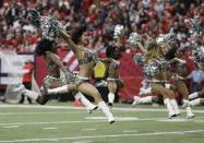 <p>Atlanta Falcons cheerleaders wearing Salute to Service costumes perform during the first of an NFL football game between the Atlanta Falcons and the Arizona Cardinals, Sunday, Nov. 27, 2016, in Atlanta. (AP Photo/David Goldman) </p>