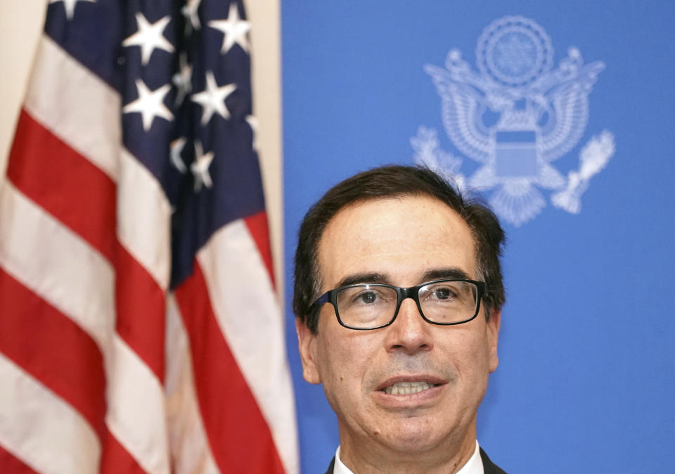 U.S. Treasury Secretary Steven Mnuchin speaks to media at the venue of G20 Finance Minister and Central Bank Governors Meeting Saturday, June 8, 2019, in Fukuoka, western Japan. (AP Photo/Eugene Hoshiko)