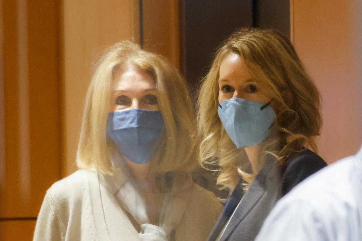 Theranos founder Elizabeth Holmes arrives to attend her fraud trial at federal court in San Jose, California, U.S., December 17, 2021. REUTERS/Peter DaSilva