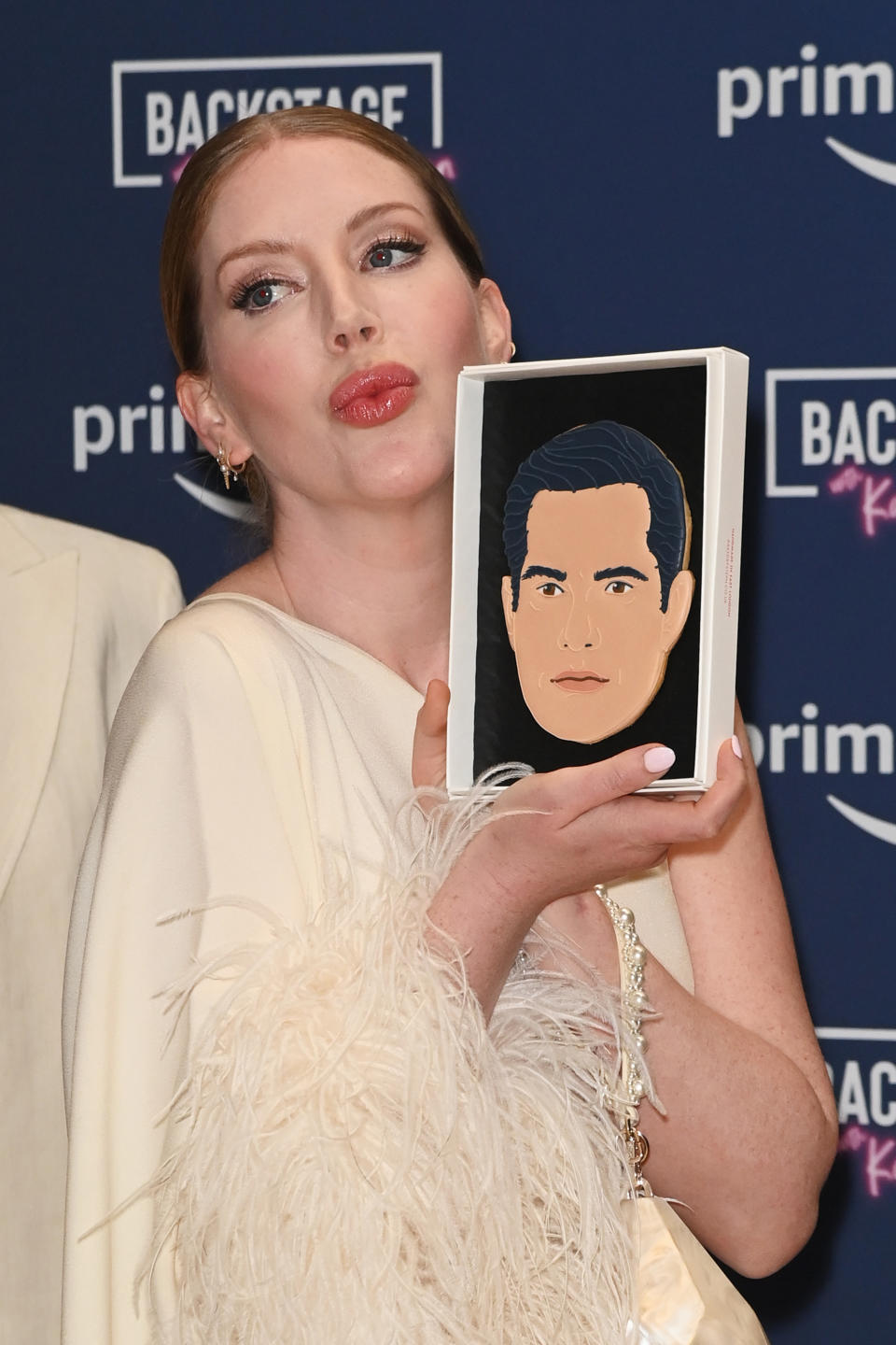 LONDON, ENGLAND - JUNE 06: Katherine Ryan holds up a drawing of Jimmy Carr at the launch of Prime Video's 