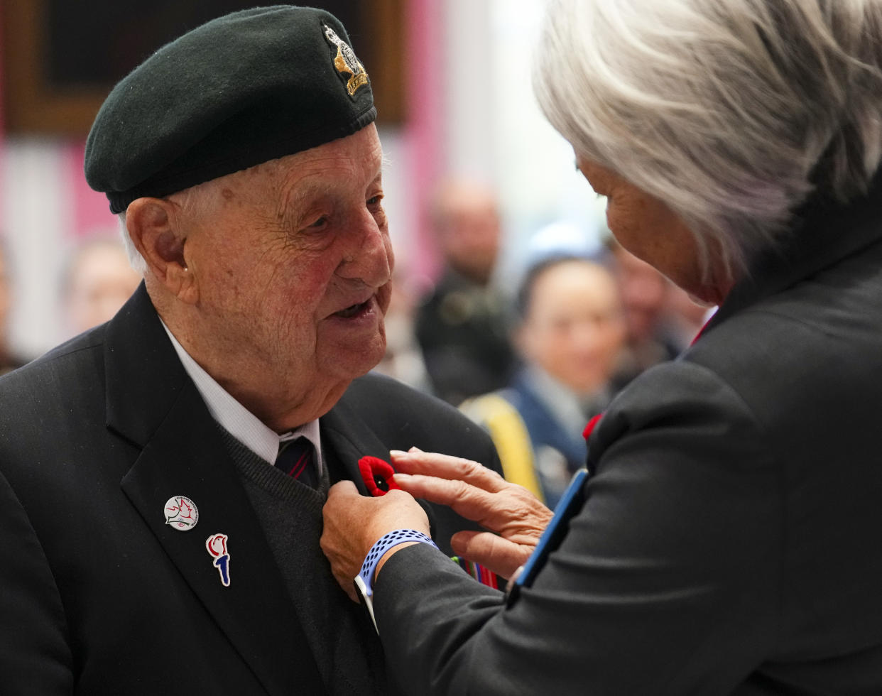 Mary Simon, Governor General and Commander-in-Chief of Canada, presents a poppy to Veteran Roland Lalonde   during a ceremony to launch this year's National Poppy Campaign at Rideau Hall on Friday, Oct. 20, 2023. THE CANADIAN PRESS/Sean Kilpatrick