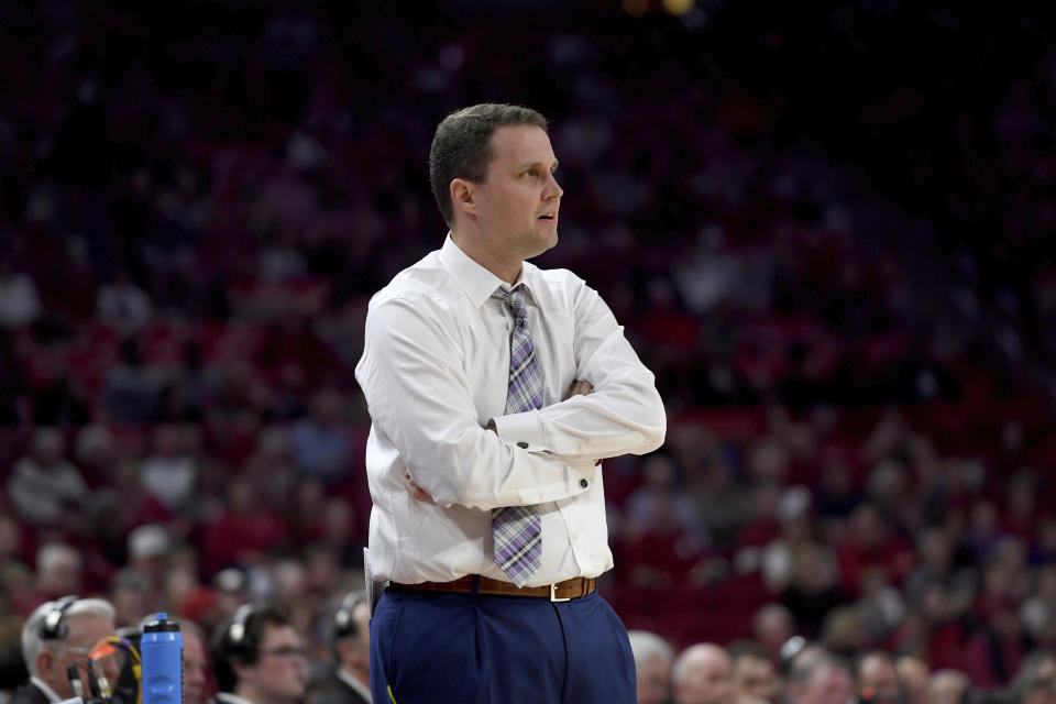 LSU coach Will Wade on the sidelines against Arkansas during an NCAA college basketball game Wednesday, March 4, 2020, in Fayetteville, Ark. (AP Photo/Michael Woods)