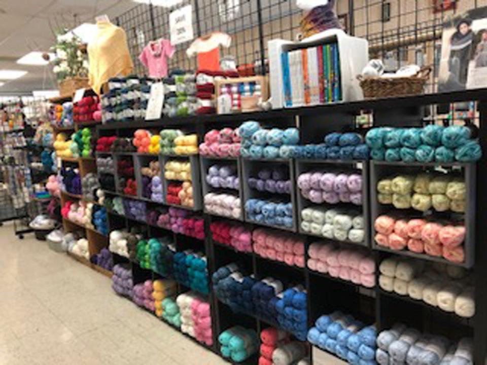 Shelves of colorful yarn skeins are seen at the Bird's Nest in downtown Macomb.