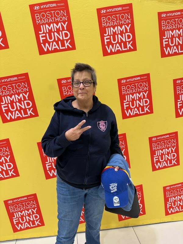 Quincy resident and metastatic breast cancer patient Carol Gormley poses for a photo in Boston on Oct. 1 before registering for this year's Jimmy Fund Walk.