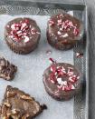 <p>Candy canes atop peppermint infused fudge brownies make this a go-to dessert for the holiday season.</p><p><strong><a href="https://www.countryliving.com/food-drinks/recipes/a3526/fudgy-peppermint-cups-recipe-clv1210/" rel="nofollow noopener" target="_blank" data-ylk="slk:Get the recipe for Fudgy Peppermint Cups" class="link ">Get the recipe for Fudgy Peppermint Cups</a>.</strong></p>