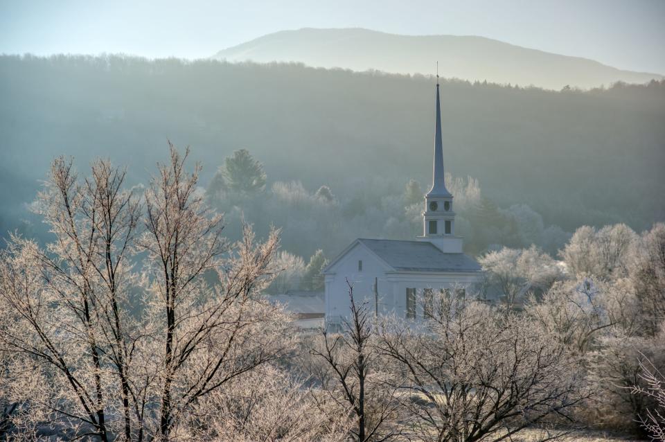 Stowe Community Church on a cold frosty fall morning in Stowe, Vermont, USA.