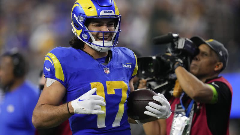 Los Angeles Rams receiver Puka Nacua smiles after a reception during a game against the New Orleans Saints, Thursday, Dec. 21, 2023, in Inglewood, Calif. The former BYU star is on the cusp of breaking two NFL rookie records heading into the final week of the regular season.