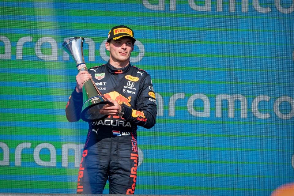 Max Verstappen celebrates after winning the United States Grand Prix Race at Circuit of the Americas.