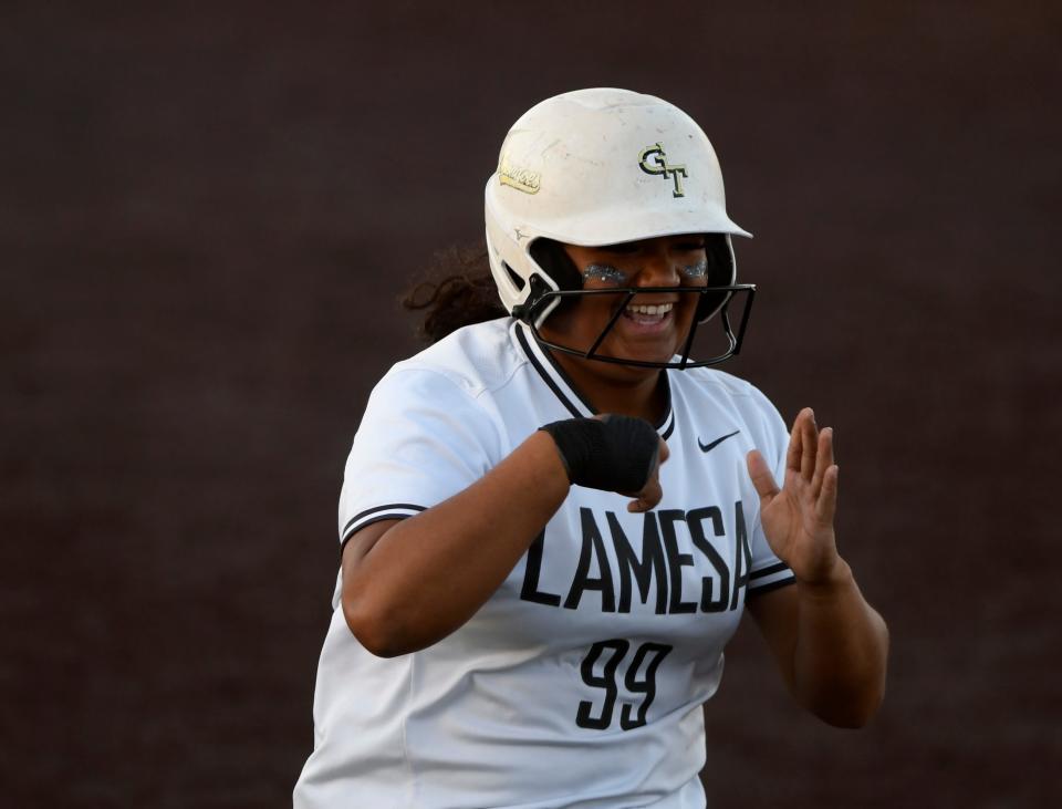 Lamesa's Zoey Sifuentes gestures after hitting a home run against Shallowater in the Class 3A area softball playoff game, Saturday, May 5, 2023, at Maner Park at Lubbock Christian University.